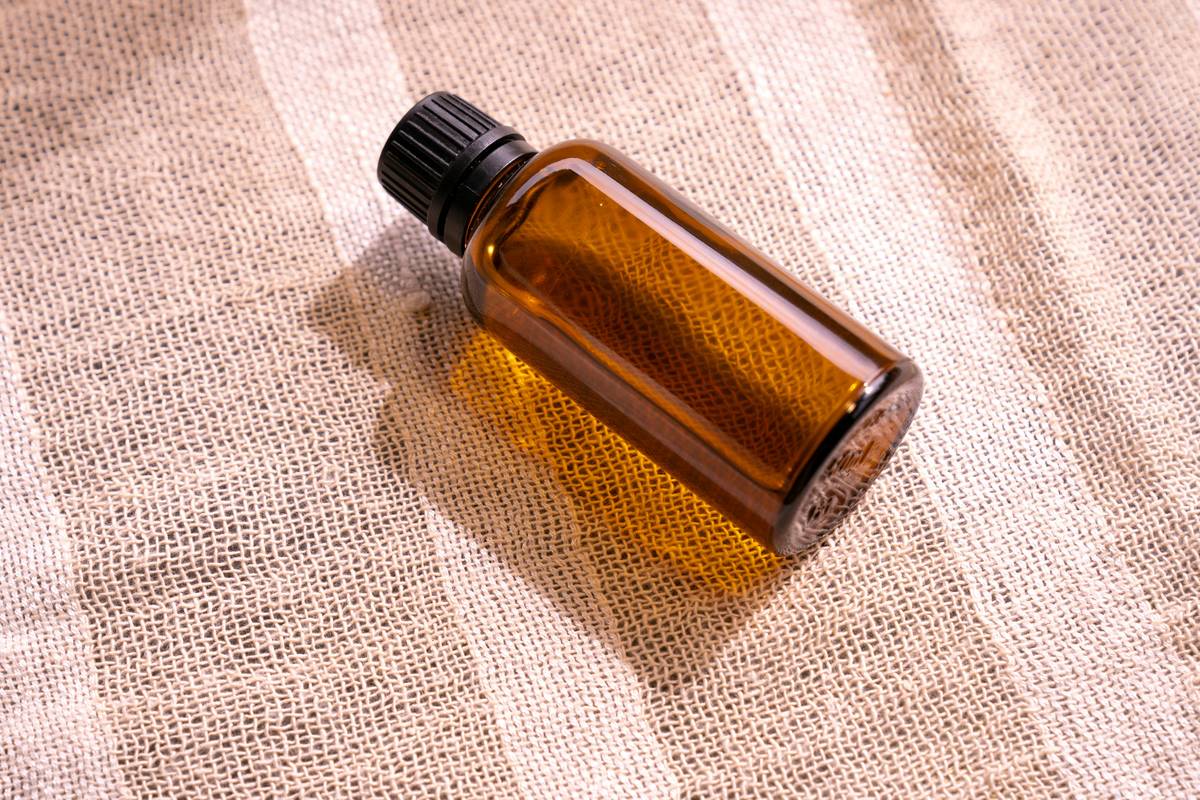 Set of aromatherapy scented oil how to use bottles stored in wooden box with labels